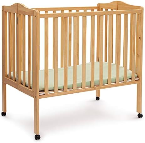 Delta Children Folding Portable Mini Baby Crib with 1.5-inch Mattress - Greenguard Gold Certified, Natural
