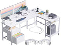 Furologee White 59” L Shaped Desk with Power Outlet, Reversible Computer Desk with File Drawer & 2 Monitor Stands, Corner Home Office Table with Storage Shelves for Gaming Writing