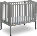 Delta Children Folding Portable Mini Baby Crib with 1.5-inch Mattress - Greenguard Gold Certified, Grey