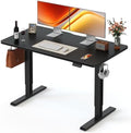 FEZIBO 55 x 24 Inchs Electric Standing Desk, Height Adjustable, Sit Stand Up, Computer Office Desk with Splice Board, Black Frame/Black Top