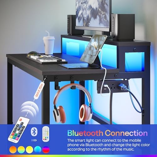 YATINEY Small Computer Desk with Charging Station and LED Lights, Gaming Desk with Monitor Stand, 2-Tier Home Office Desk with 4 Side Hooks, for Living Room, Home Office, Black DN01UDBBY2