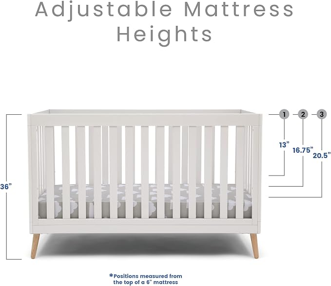 Delta Children Essex 4-in-1 Convertible Baby Crib, Bianca White with Natural Legs