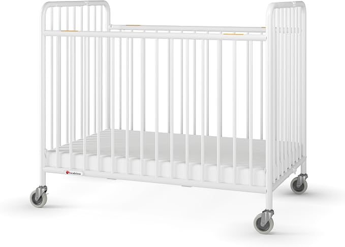Foundations Stowaway Metal Baby & Toddler Folding Hotel Crib, White